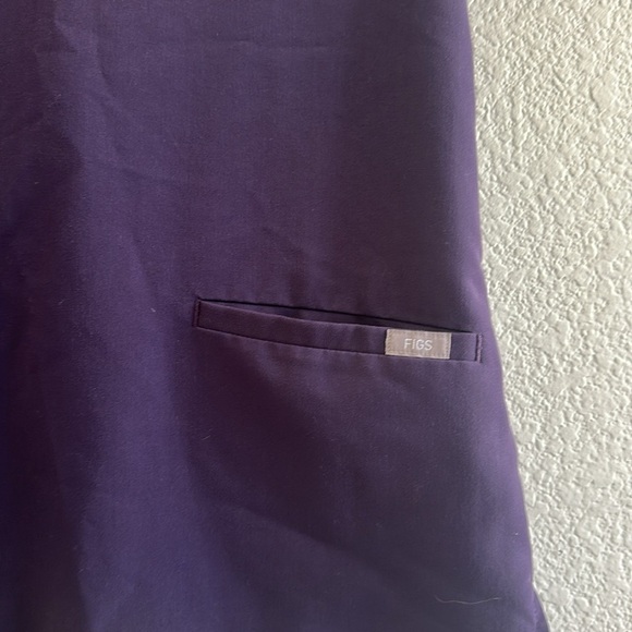 FIGS Purple Shadow Casma Three-Pocket
Scrub Top in Purple Shadow - Picture 5 of 7
